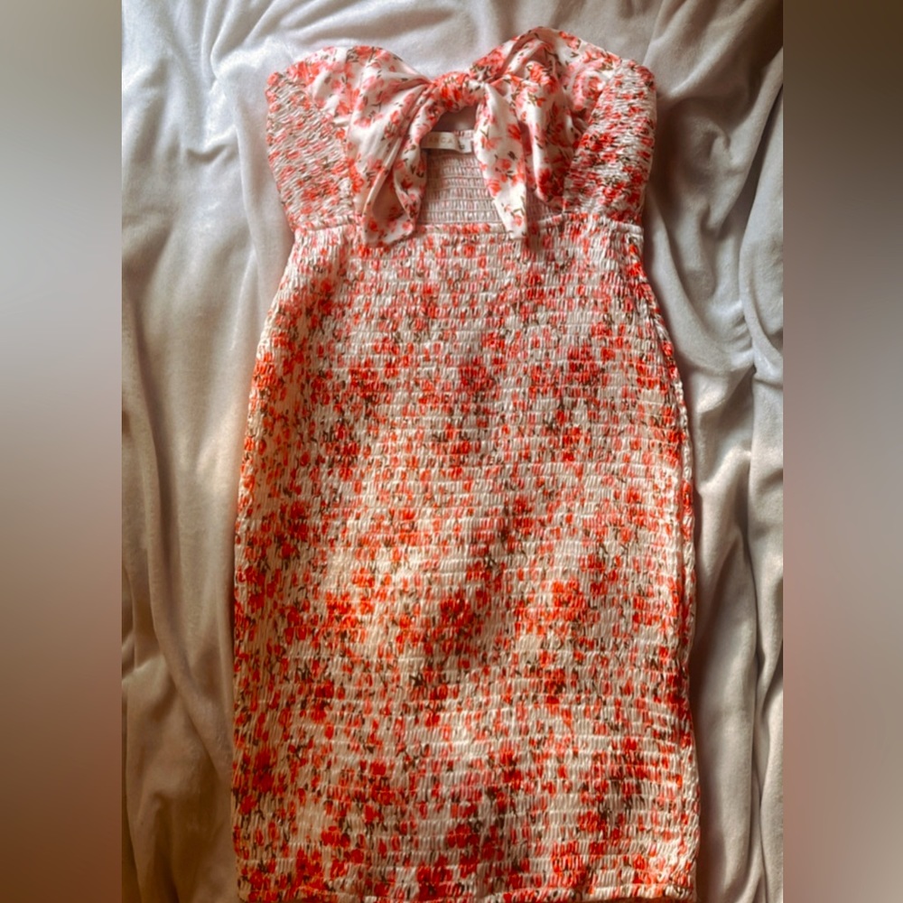Brand new divided beautiful pink mini dress with cross tie front size small